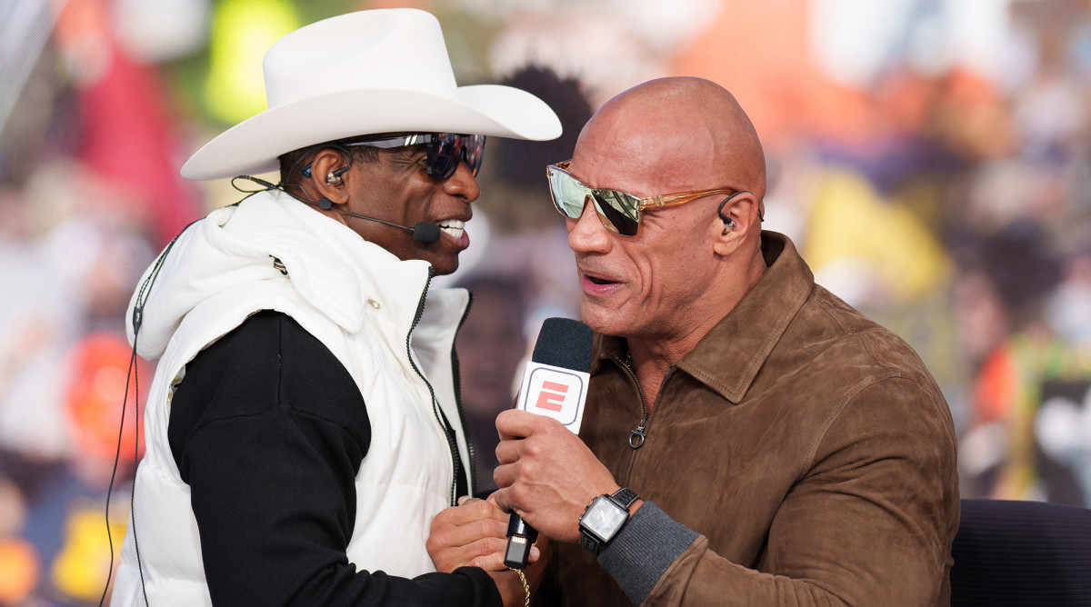 Deion Sanders meeting The Rock.